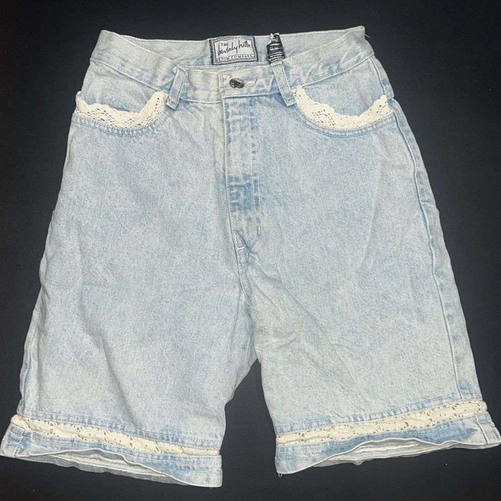 Vintage high waisted denim biker shorts with crochet lace accents